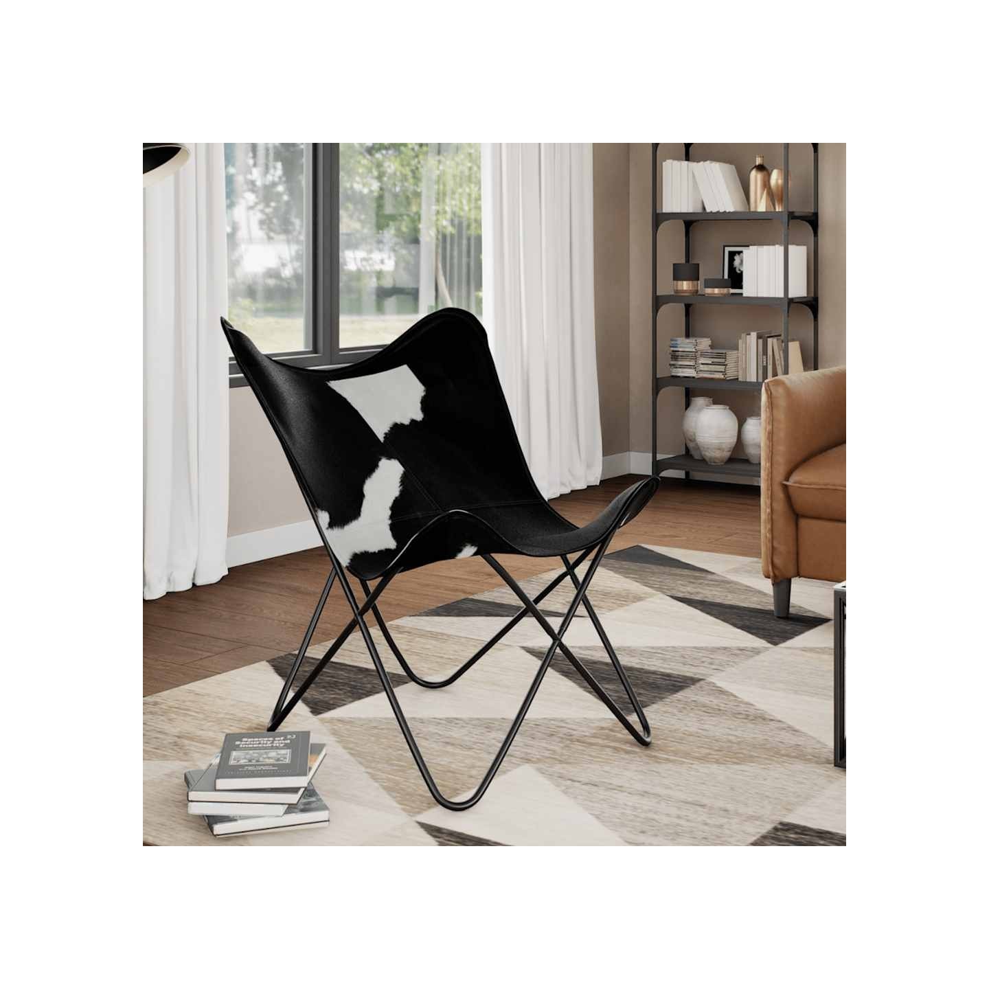 Chaise papillon noir et blanc cuir de vache