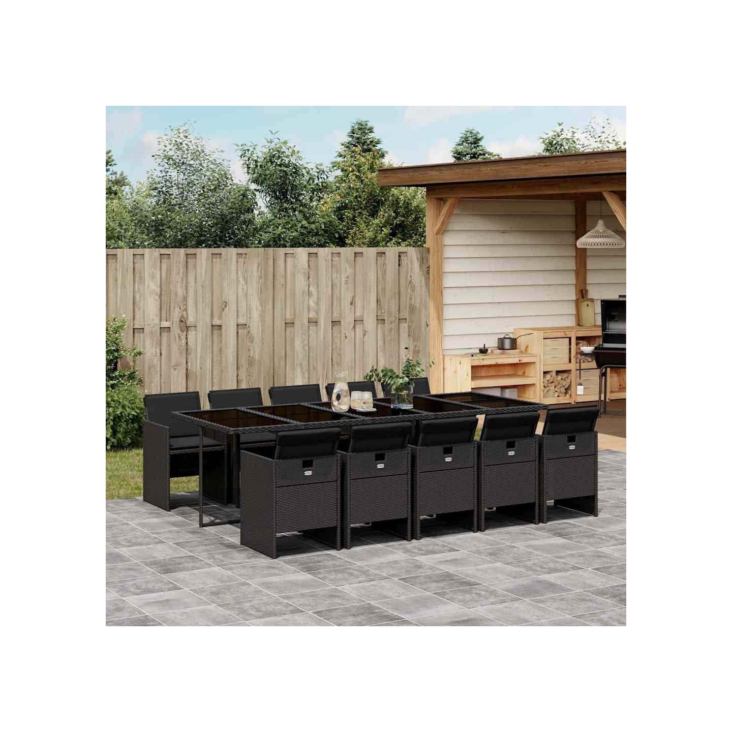 Ensemble à manger de jardin 11 pcs coussins noir résine tressée