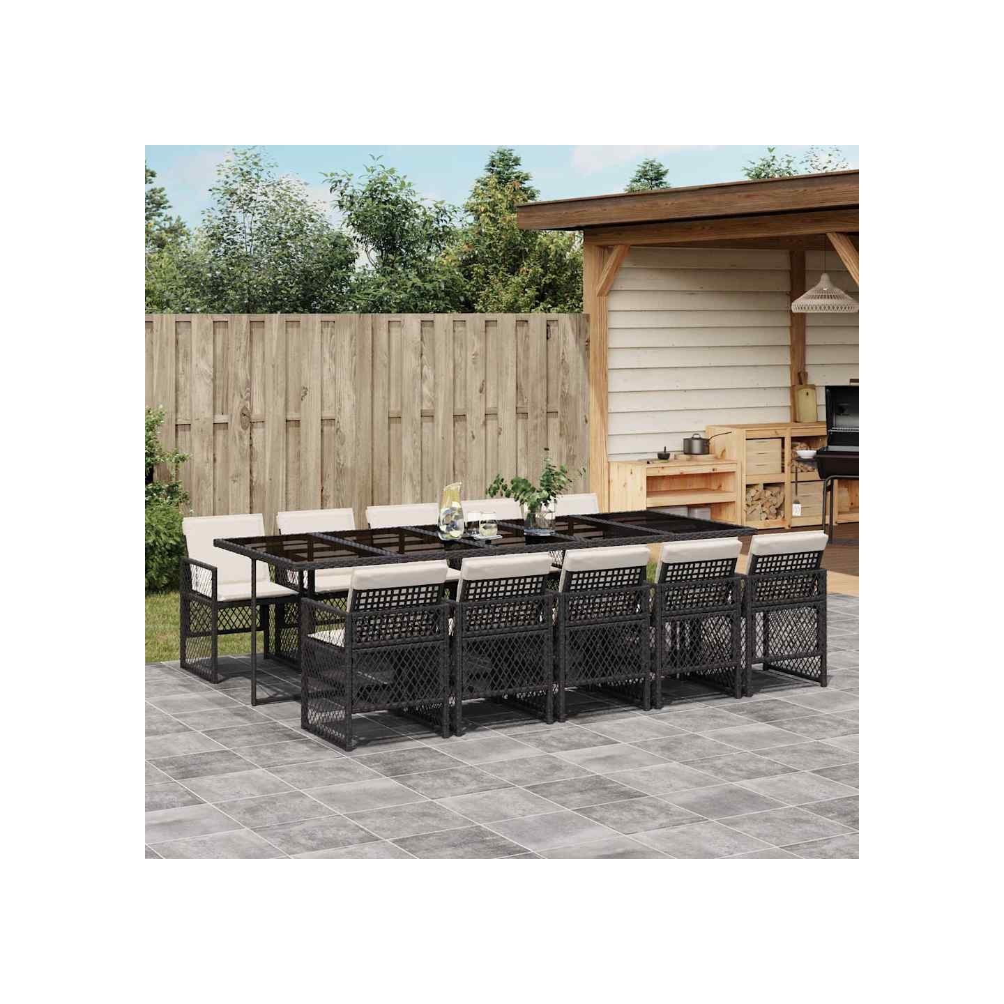 Ensemble à manger de jardin 11 pcs coussins noir résine tressée