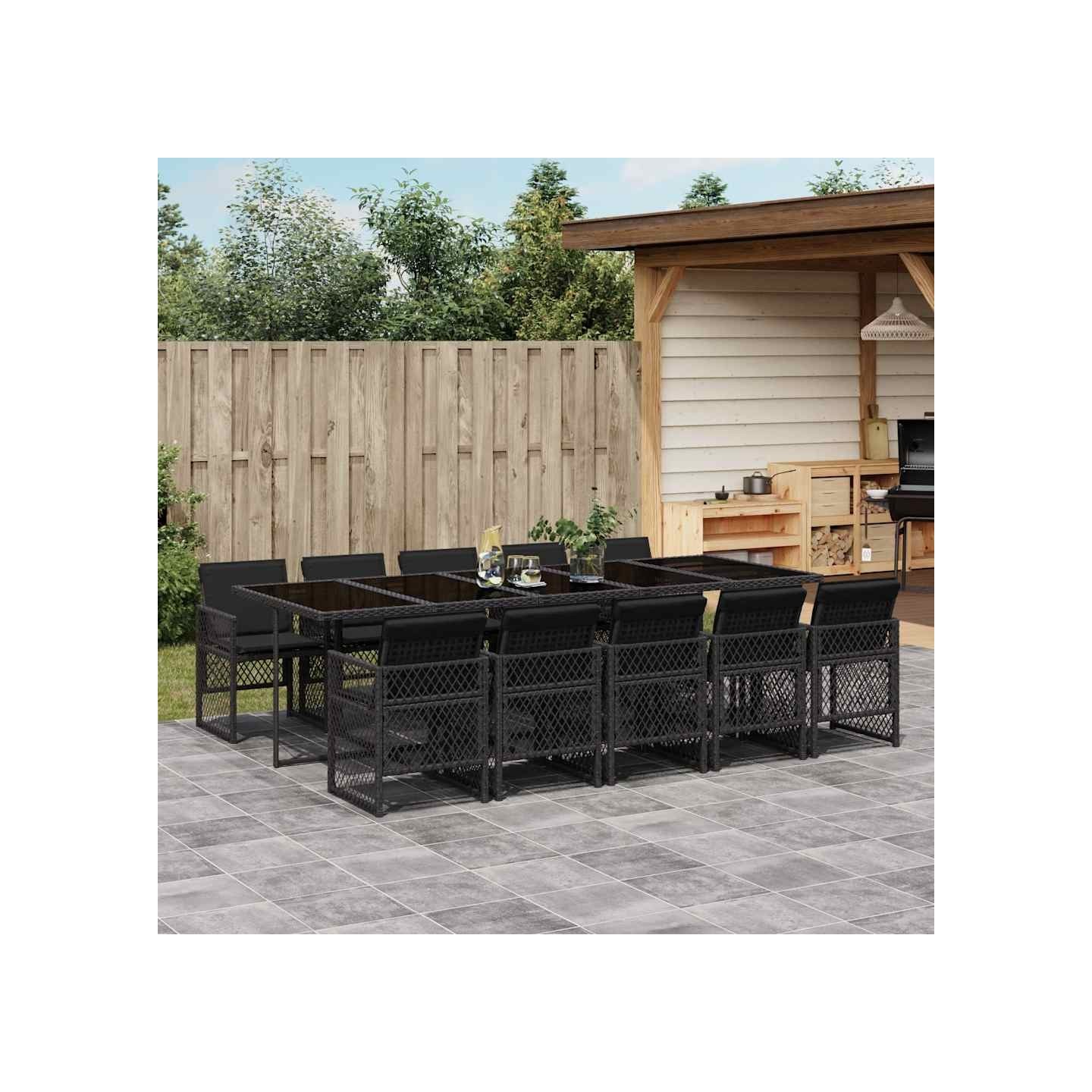 Ensemble à manger de jardin 11 pcs coussins noir résine tressée