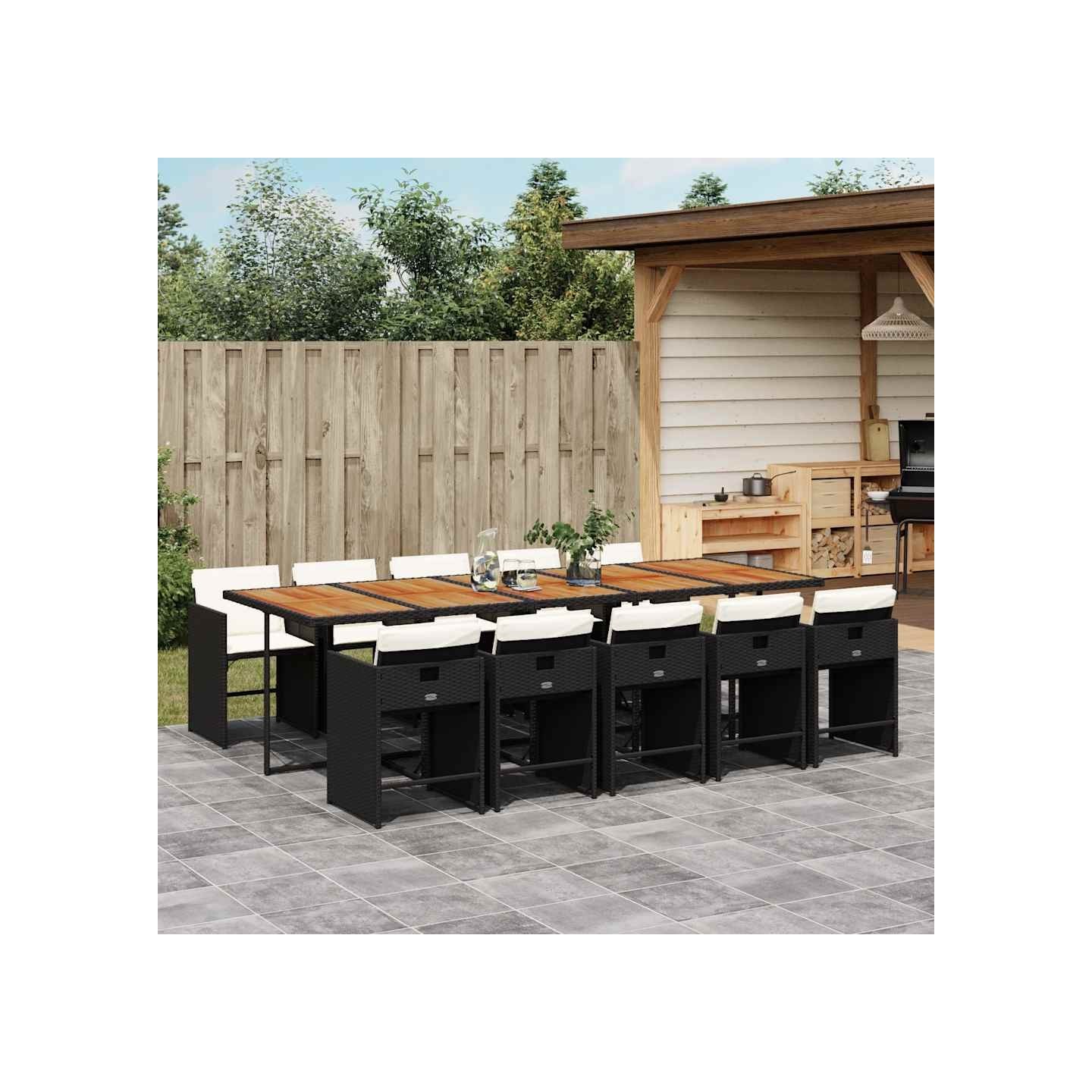 Ensemble à manger de jardin 11 pcs coussins noir résine tressée