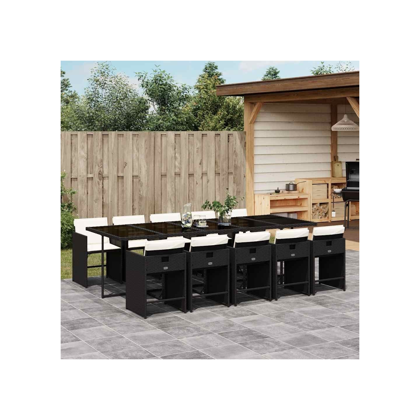 Ensemble à manger de jardin 11 pcs coussins noir résine tressée