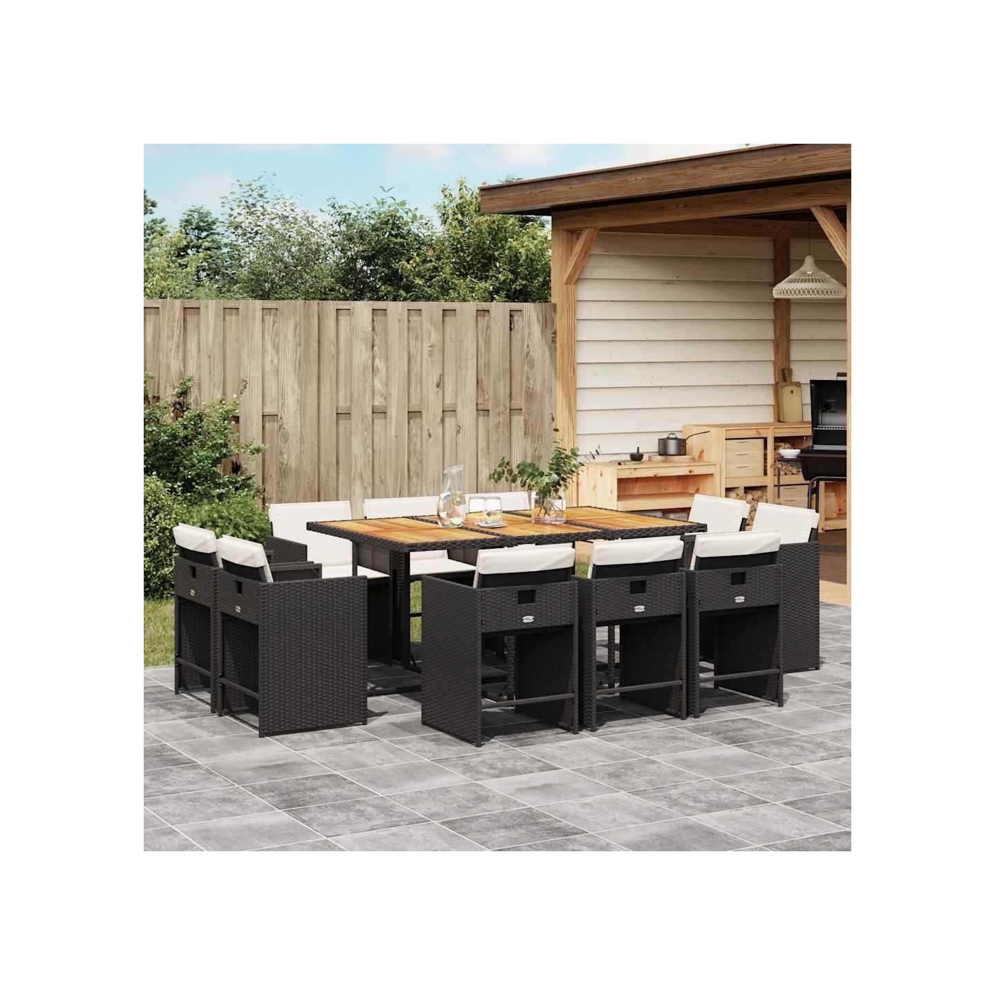 Ensemble à manger de jardin 11 pcs coussins noir résine tressée