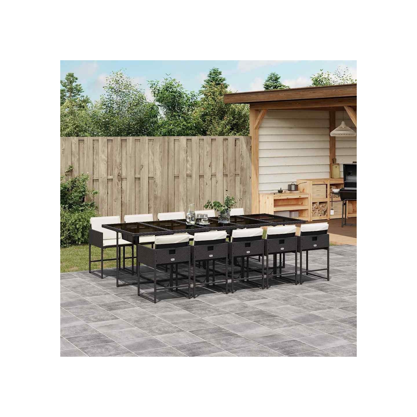 Ensemble à manger de jardin 11 pcs coussins noir résine tressée
