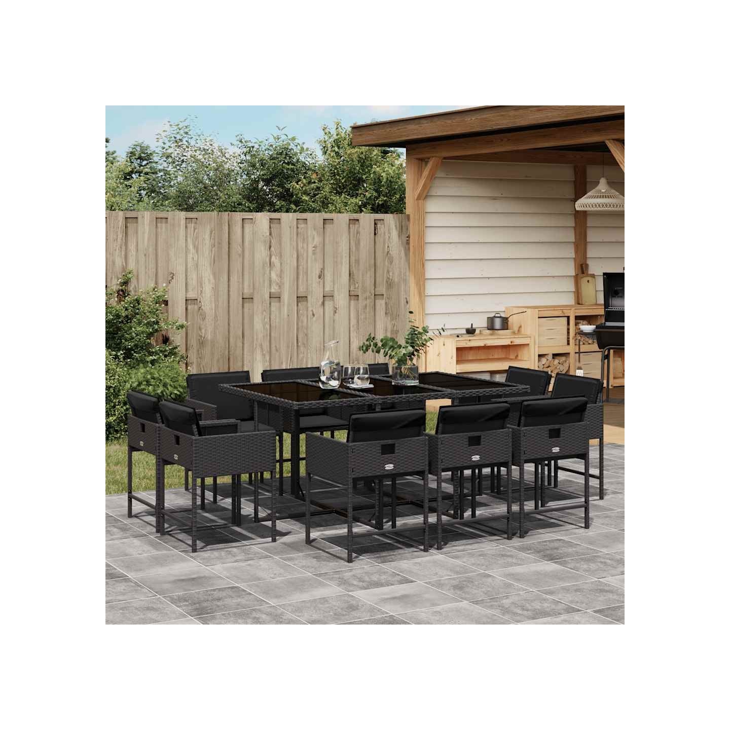 Ensemble à manger de jardin 11 pcs coussins noir résine tressée