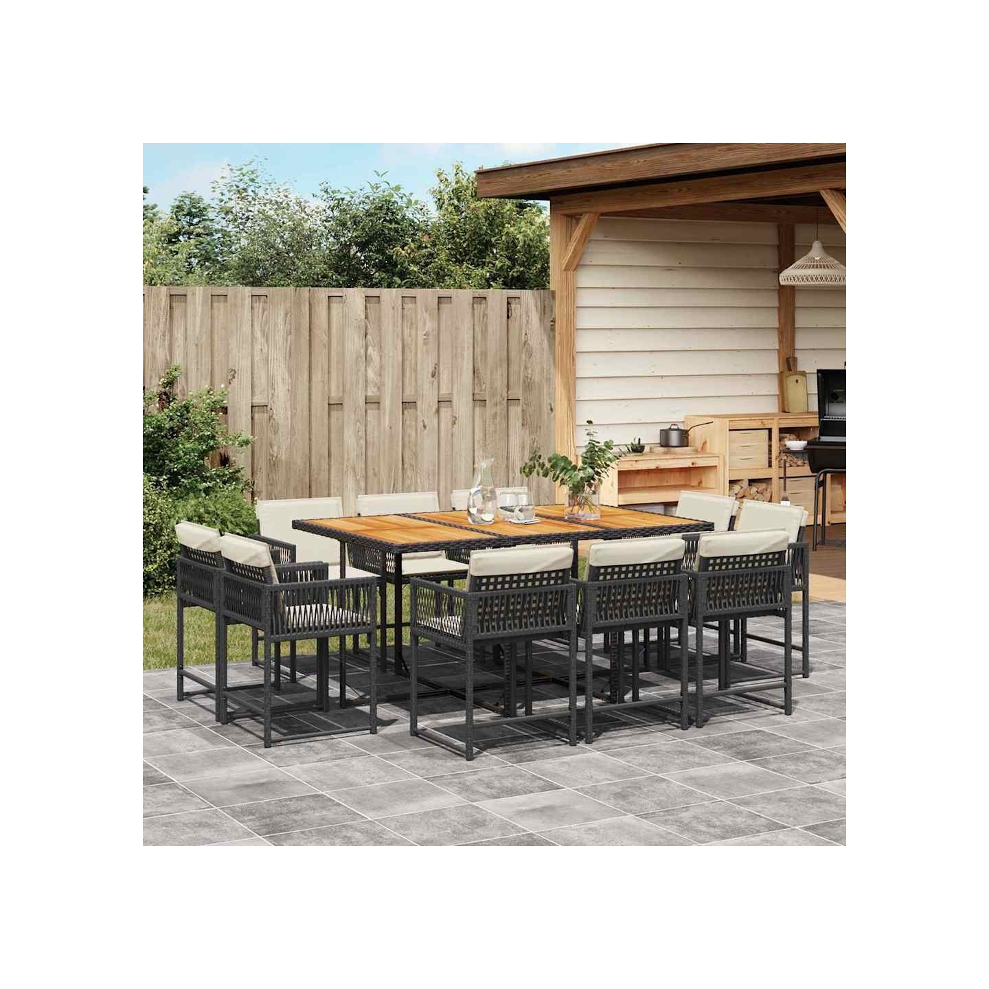Ensemble à manger de jardin 11 pcs coussins noir résine tressée