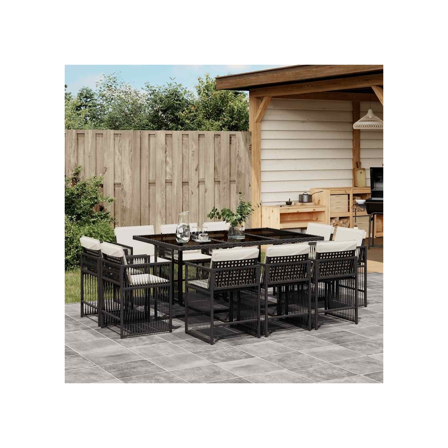 Ensemble à manger de jardin 11 pcs coussins noir résine tressée