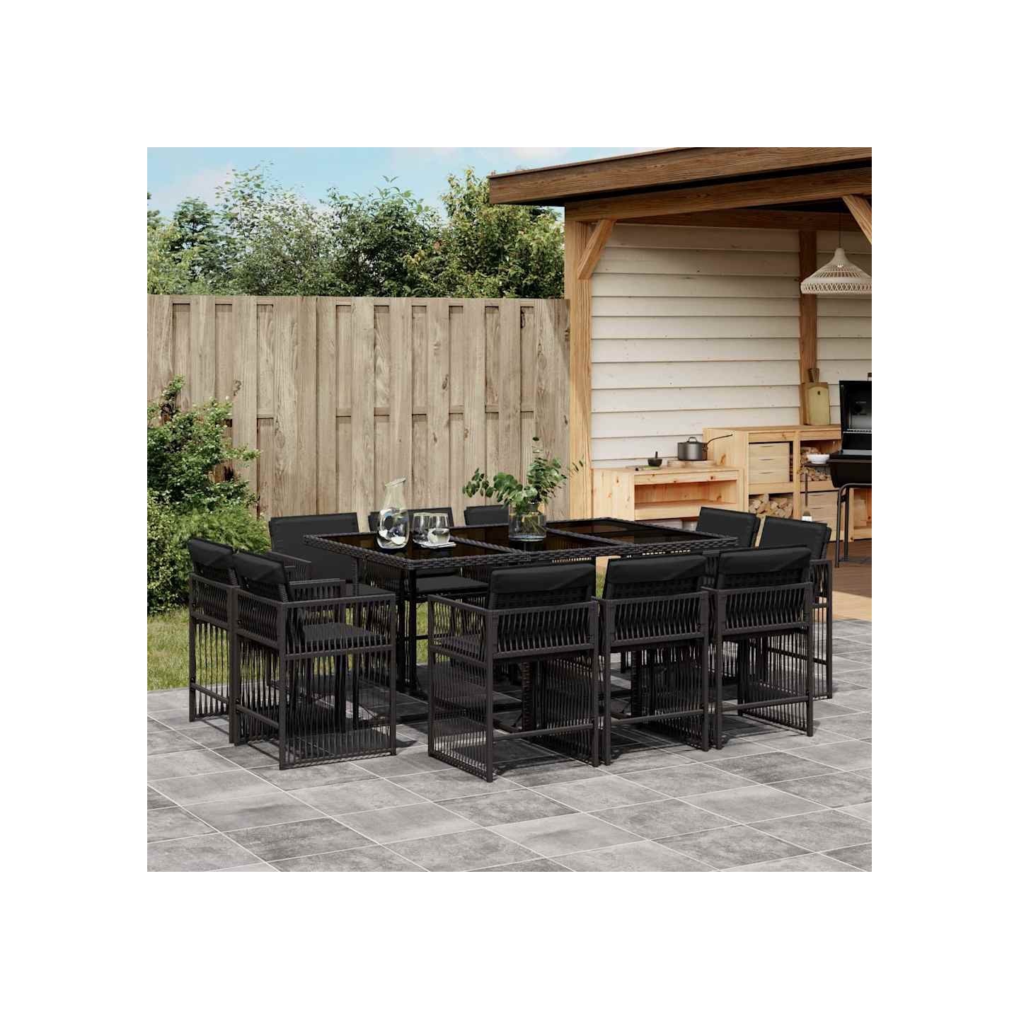 Ensemble à manger de jardin 11 pcs coussins noir résine tressée