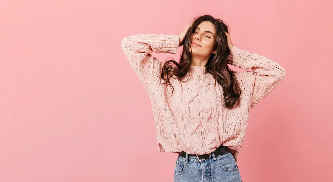 Woman in kitted sweater