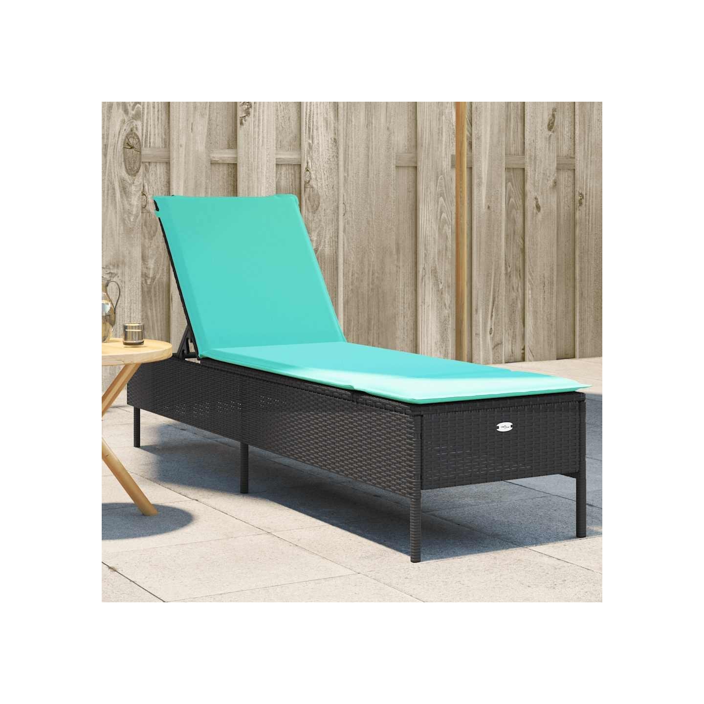 Chaise longue avec coussin en rotin synthétique noir